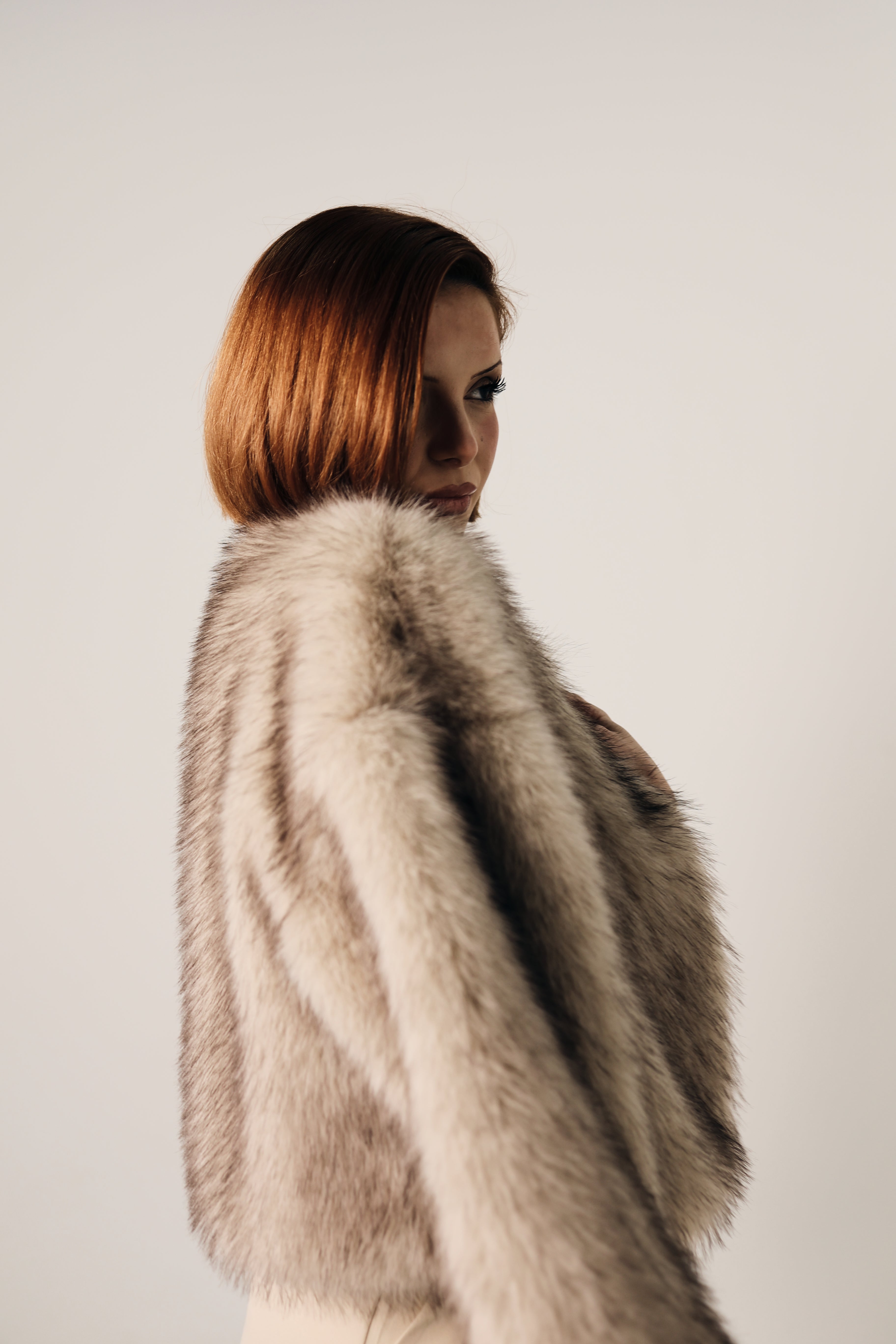 Manteau court effet fourrure